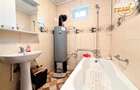 Casa cu teren generos de 1.315 mp, bucatarie de vara complet renovata si acces d