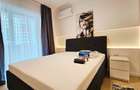 Ofer spre închiriere apartament 2 camere decomandat plus loc parcare subteran  - 5