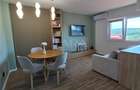 Apartament modern cu 3 camere, balcon generos și parcare subterană. - 2