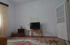 Casă individuală cu demisol + parter • 130 mp utili • Curte 237 mp • Garaj - 18