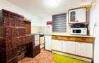 Casa cu teren generos de 1.315 mp, bucatarie de vara complet renovata si acces d