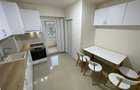 Inchiriez ap. 2 camere, minim 2 ani, renovat, garaj, et.2, lift, balcon 12 mp. - 11