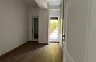 Apartament in Pipera la parter cu 4 camere, curte privată de 30 mp și 2 locuri d