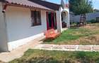 Vand  casa  3 camere tg.jiu periferia. 2 km jumate de la moll. Mp.88/120. +teren - 1