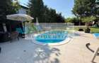 Casa P+1+M cu teren de 650 mp, piscina si curte complet amenajata