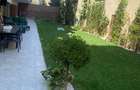 Apartament în Arcadia Domenii,230mp curte,3 parcări incluse
