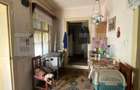 Casă cu teren 10 ari, 2 anexe și dublu front stradal – Beclean