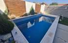 Duplex minimalist cu piscina