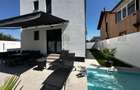 Casa de vanzare Berceni  P+1E - 5 camere - 3 bai - piscina si curte amenajata