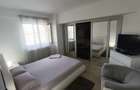Apt 2 cam. 49.81 m.p. mobilat si utilat, loc de parcare subteran+boxa-33.03 m.p. - 6