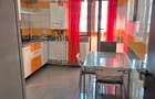 Un apartament cochet, cu parcare proprie, aproape de parcuri si birouri
