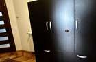 Apartament in casa cu 2 camere ,beci si curte pe Strada Titulescu ,zona Afi - 13