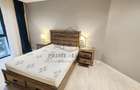 Apartament situat la etajul doi al unui bloc cu 3 etaje