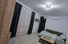 Apartament în bloc nou, cu parcare subterană.