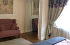 Sanctuar de Lux în Dorobanți: Apartament deosebit cu șemineu și finisaje nobile - 11