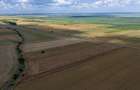 Vând teren agricol la șosea de 30.000mp în Iazurile comuna Valea Nucarilor 