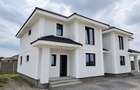Duplex despartit prin C.T. - bucatarie inchisa - 130 mp utili - 1