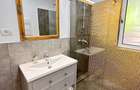 Închiriez apartament 2 camere, cu gradina amenajată in bloc nou.