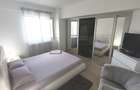 Apt 2 cam. 49.81 m.p. mobilat si utilat, loc de parcare subteran+boxa-33.03 m.p. - 10