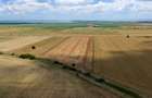 Vând teren agricol la șosea de 30.000mp în Iazurile comuna Valea Nucarilor 