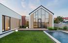 Casă Parter cu Design Minimalist și Piscină - 1