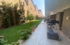 Apartament în Arcadia Domenii,230mp curte,3 parcări incluse