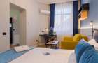 DE ÎNCHIRIAT Cladire Boutique, 12 Unități finisate premium, zona Romană-Eminescu - 32