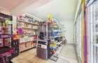 Casa cu 5 camere si magazin alimentar, functional, teren 1715 mp - 26
