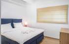 Apartament de inchiriat 2 camere, parcare proprie. Serviciu curatenie optional.