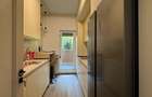 Apartament in Pipera la parter cu 4 camere, curte privată de 30 mp și 2 locuri d