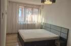 Un apartament cochet, cu parcare proprie, aproape de parcuri si birouri