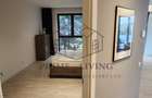 Apartament situat la etajul doi al unui bloc cu 3 etaje