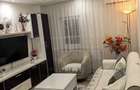Vanzare apartament cu 3 camere si 2 bai,  decomandat,  renovat,  parter zona CET - 1