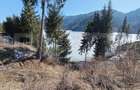 Teren intravilan de vânzare – 1200 mp Colibita, front lac 70