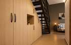 Apartament pe două niveluri cu supantă, mobilier la comandă și loc de parcare
