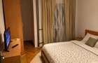Închiriez 2 camere decomandat, 52 mp, renovat, 2 bal., AC nou, Păcurari - Posta - 2