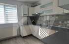 Apartament modern cu 2 camere, curte privată și 2 locuri de parcare