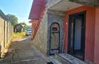 Proprietate deosebită în Buftea – casă P+1, teren 3.500 mp, magazin închiriat, l - 1