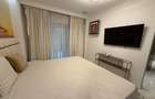 Apartament în Arcadia Domenii,230mp curte,3 parcări incluse