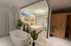 Apartament în Arcadia Domenii,230mp curte,3 parcări incluse