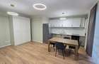 Închiriez apartament 3 camere în bloc nou - 1