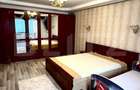 Apartament de vanzare, cu 2 camere, 54 mp, zona Racadau - 1