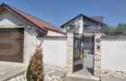 Casă de vânzare, teren de 1.000 mp, zona Titu - 2