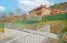 La poalele Tâmpei — vilă contemporană în Schei - 36