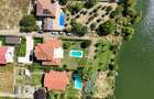 Vilă elegantă cu piscină și ieșire la Lac – Căciulați, Balotești - 3
