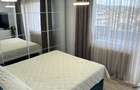 Apartament cu 2 dormitoare + living cu bucătărie open-space + 2 balcoane  - 9