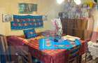 Casa taraneasca de lemn cu veranda - 9