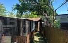 Casa cu garaj si teren + anexe, 100 mp, zona Produlești