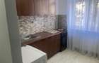 Garsoniera de inchiriat in Focsani , zona Gara , et 1 4 , renovata si mobilata c - 7