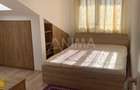 Apartament cu 2 dormitoare + living cu bucatarie, parcare subterana - 10